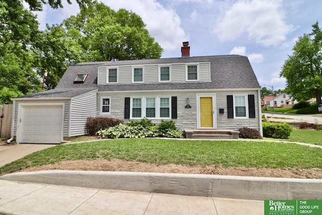 1115 S 63rd St, Omaha, NE 68106 - colonial inspired home featuring a chimney, an attached garage, a front yard, concrete driveway, and a shingled roof