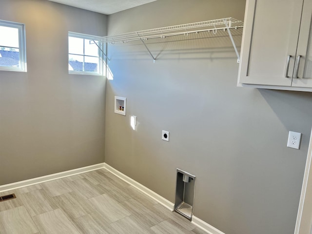 8619 N 176th St, Bennington, NE 68007 - laundry area featuring hookup for a washing machine, cabinet space, and hookup for an electric dryer