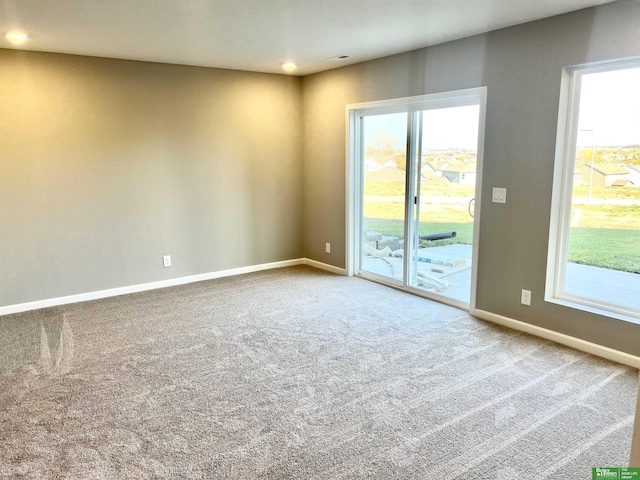 8619 N 176th St, Bennington, NE 68007 - unfurnished room featuring carpet flooring and baseboards