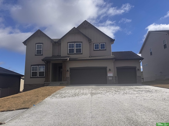 8625 N 177th St, Bennington, NE 68007 - craftsman-style house with concrete driveway, board and batten siding, and a garage