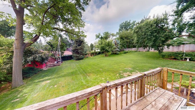 7923 Harney St, Omaha, NE 68114 - fenced backyard featuring a deck