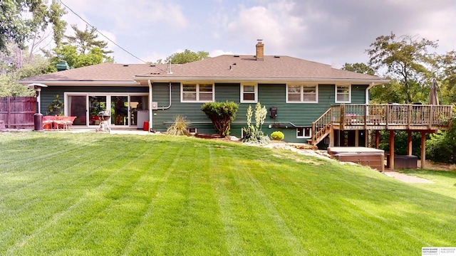 7923 Harney St, Omaha, NE 68114 - rear view of property featuring a hot tub, a deck, and a chimney