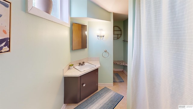 7923 Harney St, Omaha, NE 68114 - bathroom with vanity and tile patterned floors