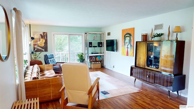 7923 Harney St, Omaha, NE 68114 - living area with wood finished floors