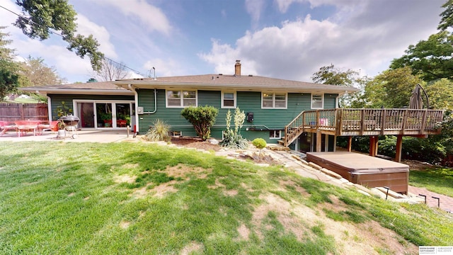 7923 Harney St, Omaha, NE 68114 - rear view of house featuring a hot tub, a patio area, a wooden deck, a chimney, and stairs