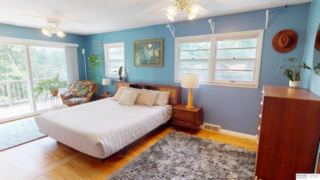 7923 Harney St, Omaha, NE 68114 - bedroom with access to outside, light wood-type flooring, and ceiling fan