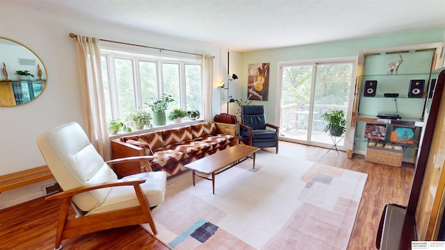 7923 Harney St, Omaha, NE 68114 - living room featuring wood finished floors