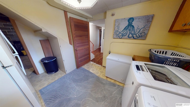 7923 Harney St, Omaha, NE 68114 - laundry area with independent washer and dryer and light floors
