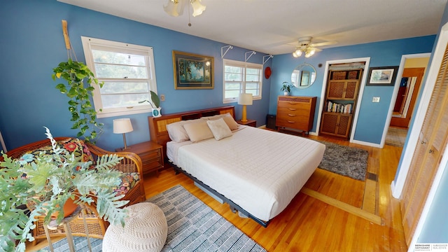 7923 Harney St, Omaha, NE 68114 - bedroom with wood finished floors and ceiling fan