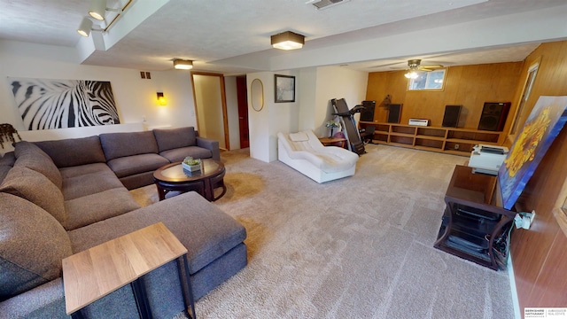 7923 Harney St, Omaha, NE 68114 - carpeted living room with a ceiling fan and wood walls