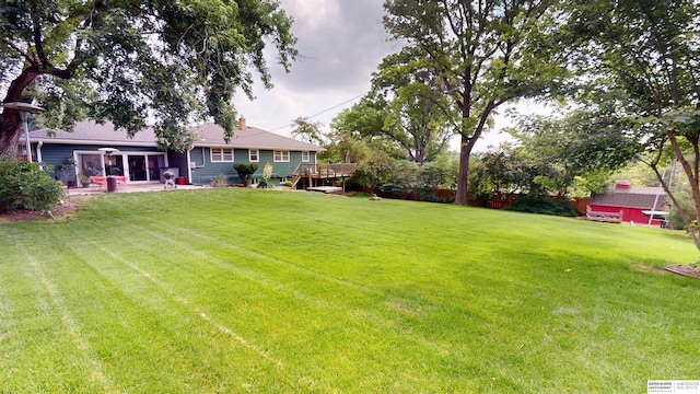 7923 Harney St, Omaha, NE 68114 - view of grassy yard with a patio
