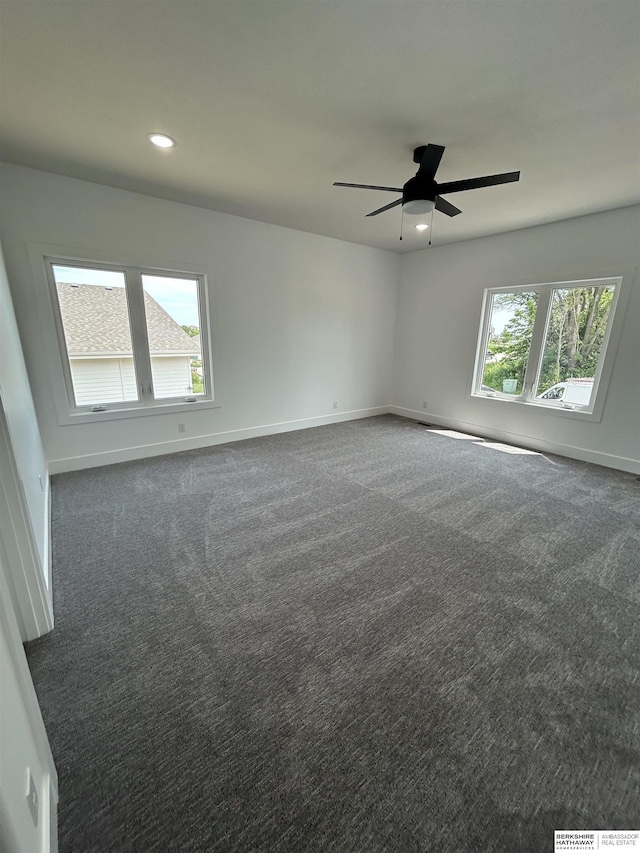 19756 Briar St, Gretna, NE 68028 - spare room featuring recessed lighting, dark colored carpet, and ceiling fan