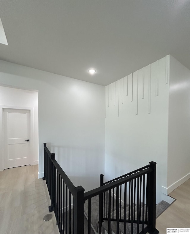 19756 Briar St, Gretna, NE 68028 - hallway with an upstairs landing, light wood-style floors, and recessed lighting
