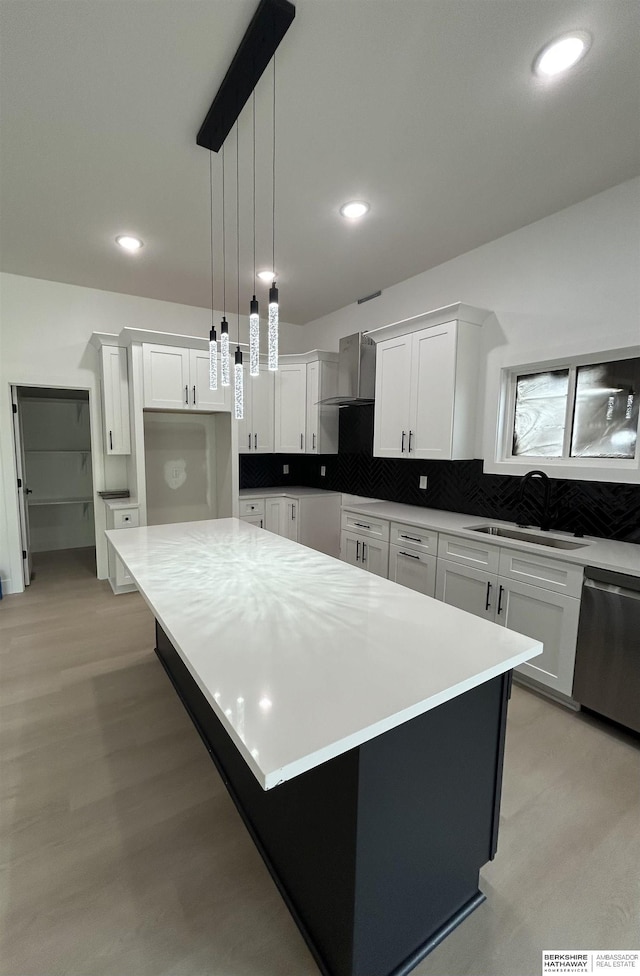 19756 Briar St, Gretna, NE 68028 - kitchen with dishwasher, wall chimney exhaust hood, a center island, tasteful backsplash, and recessed lighting