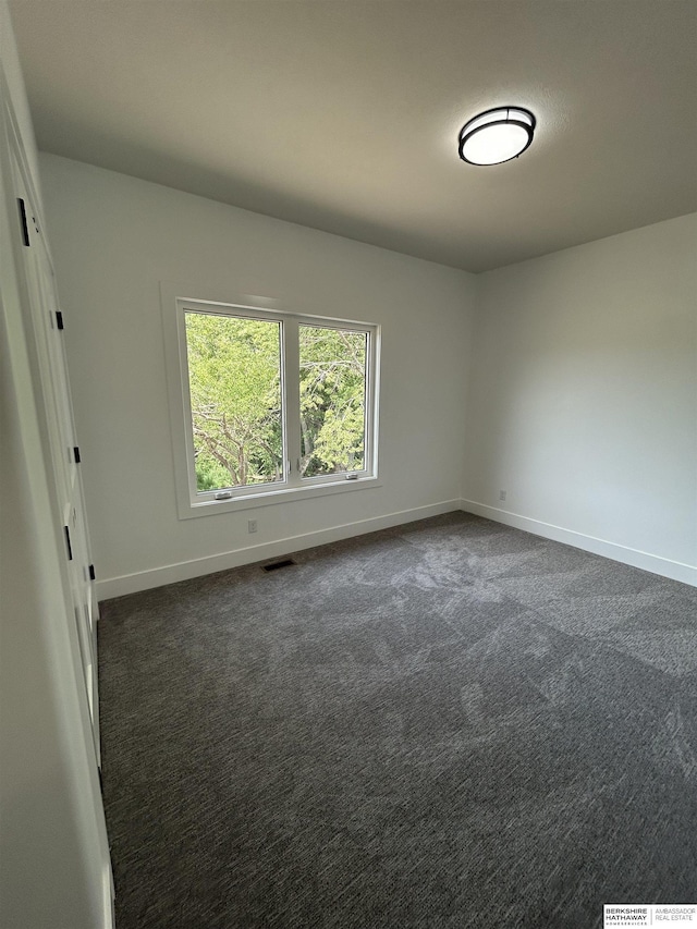19756 Briar St, Gretna, NE 68028 - unfurnished room featuring baseboards and dark colored carpet