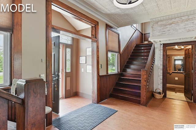 9404 N 294th St, Valley, NE 68064 - entrance foyer with wood finished floors, stairway, and an ornate ceiling