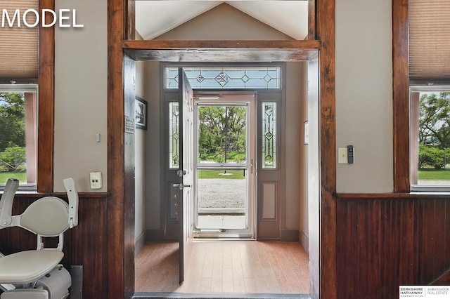 9404 N 294th St, Valley, NE 68064 - entryway featuring wood finished floors, healthy amount of natural light, and vaulted ceiling