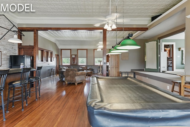 9404 N 294th St, Valley, NE 68064 - game room with wood-type flooring, crown molding, an ornate ceiling, and ceiling fan