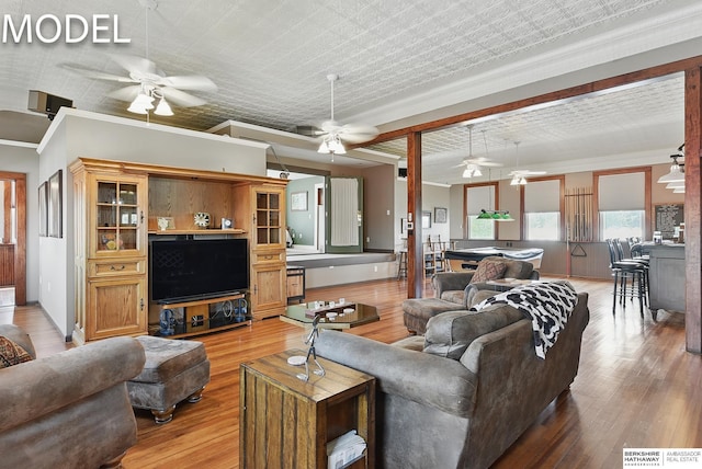 9404 N 294th St, Valley, NE 68064 - living room featuring ceiling fan, crown molding, light wood-type flooring, and pool table