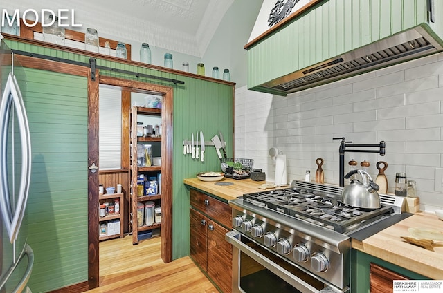 9404 N 294th St, Valley, NE 68064 - kitchen featuring appliances with stainless steel finishes, custom exhaust hood, wood counters, tasteful backsplash, and crown molding