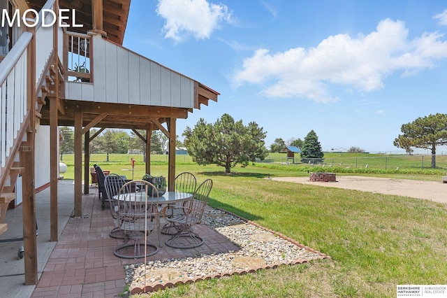 9404 N 294th St, Valley, NE 68064 - view of yard with a patio area, an outdoor fire pit, and outdoor dining space