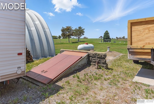 9404 N 294th St, Valley, NE 68064 - entry to storm shelter with a yard
