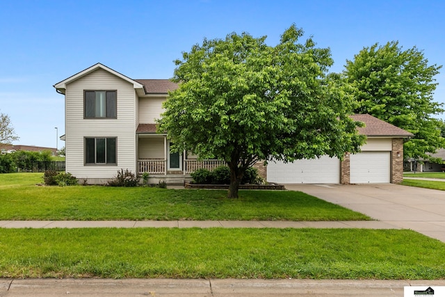 9521 N 140th St, Waverly, NE 68462 - view of front of home featuring a porch, driveway, a front yard, brick siding, and an attached garage