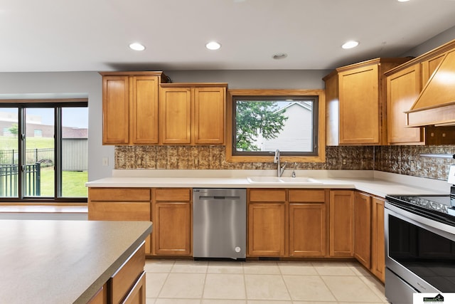 9521 N 140th St, Waverly, NE 68462 - kitchen with stainless steel appliances, healthy amount of natural light, tasteful backsplash, and recessed lighting