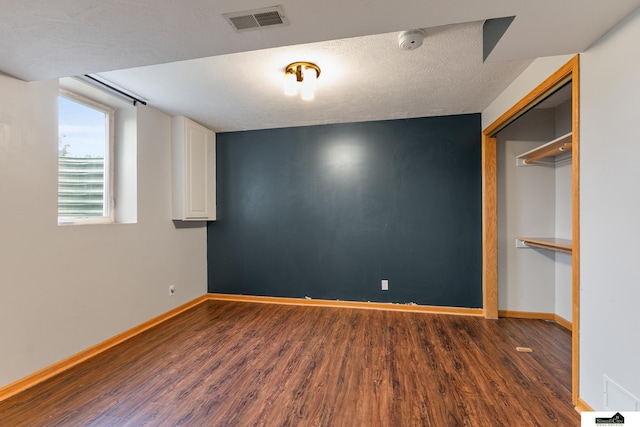 9521 N 140th St, Waverly, NE 68462 - unfurnished bedroom with wood finished floors and baseboards