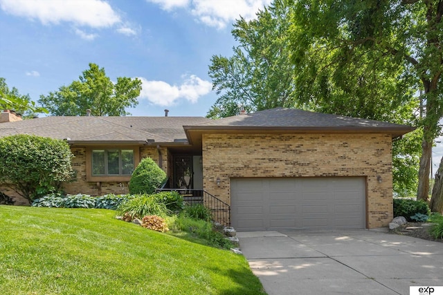 6521 Davenport Plz, Omaha, NE 68132 - view of front facade featuring brick siding, an attached garage, concrete driveway, a front yard, and roof with shingles