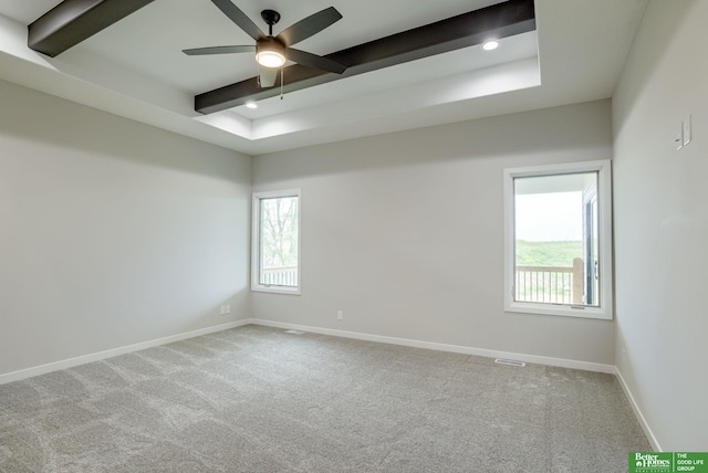 10110 Laramie St, Papillion, NE 68046 - spare room with beamed ceiling, healthy amount of natural light, carpet flooring, a ceiling fan, and recessed lighting