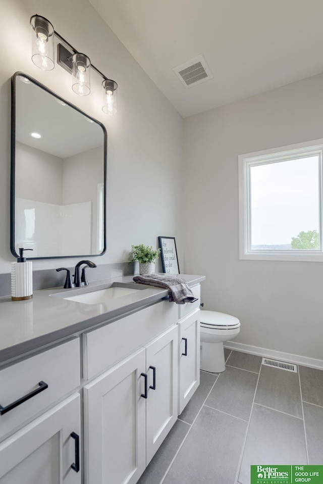 10110 Laramie St, Papillion, NE 68046 - bathroom featuring vanity and tile patterned flooring
