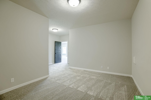 10110 Laramie St, Papillion, NE 68046 - spare room with a textured ceiling and carpet