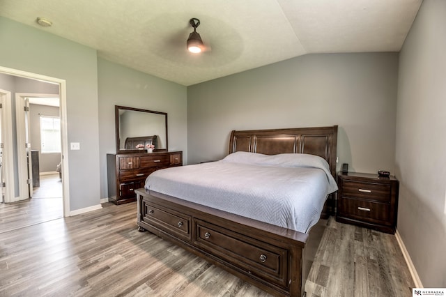 13913 Springview Dr, Papillion, NE 68133 - bedroom with light wood-type flooring, lofted ceiling, and ceiling fan