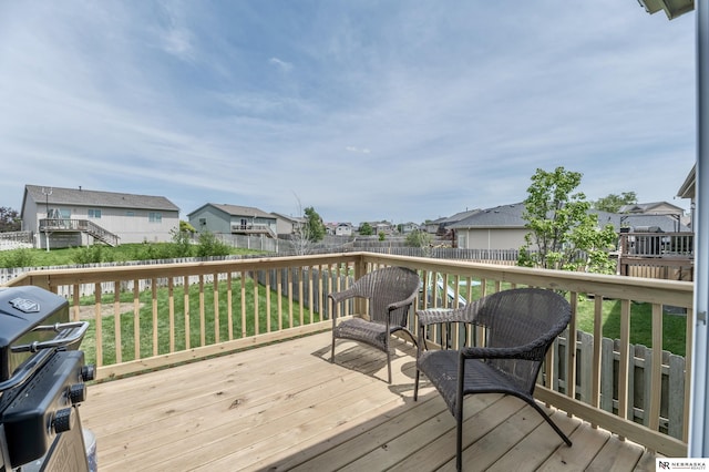 13913 Springview Dr, Papillion, NE 68133 - wooden terrace with a residential view, a fenced backyard, and grilling area