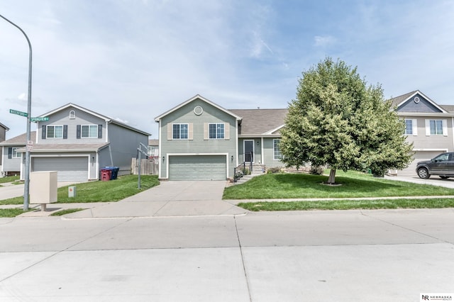 13913 Springview Dr, Papillion, NE 68133 - view of front of property with an attached garage, driveway, and a front yard