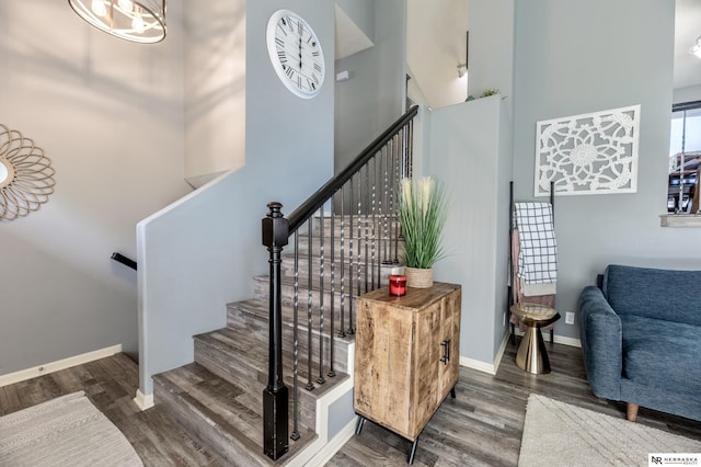 13913 Springview Dr, Papillion, NE 68133 - stairs featuring wood finished floors and a towering ceiling