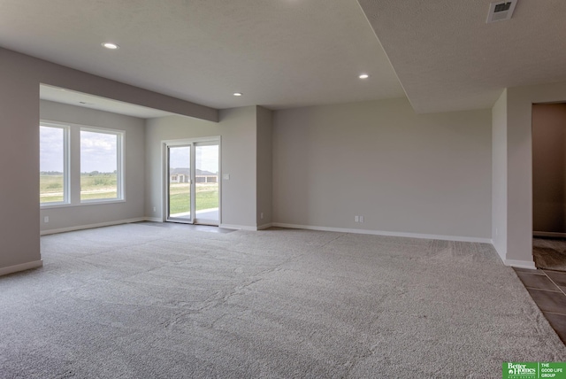 5620 N 212th St, Elkhorn, NE 68022 - carpeted spare room featuring baseboards and recessed lighting