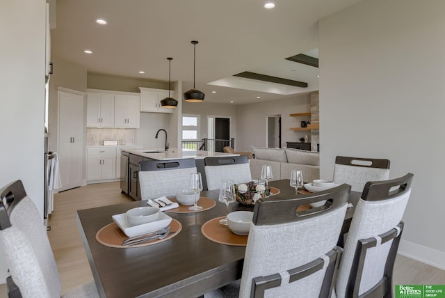5602 N 212th St, Elkhorn, NE 68022 - dining space featuring light wood-type flooring and recessed lighting
