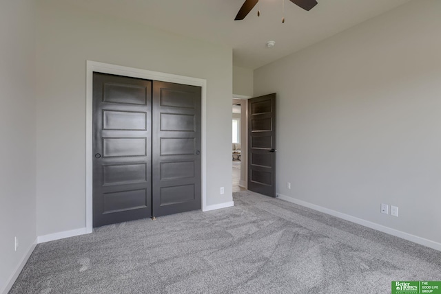 5602 N 212th St, Elkhorn, NE 68022 - unfurnished bedroom with carpet floors, a closet, and a ceiling fan
