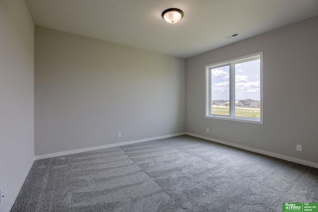 5602 N 212th St, Elkhorn, NE 68022 - carpeted empty room with baseboards