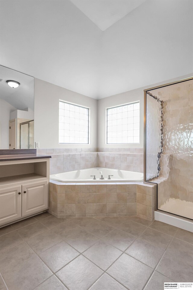 10149 Edward St, La Vista, NE 68128 - bathroom with a bath, vanity, tile patterned flooring, and a shower stall