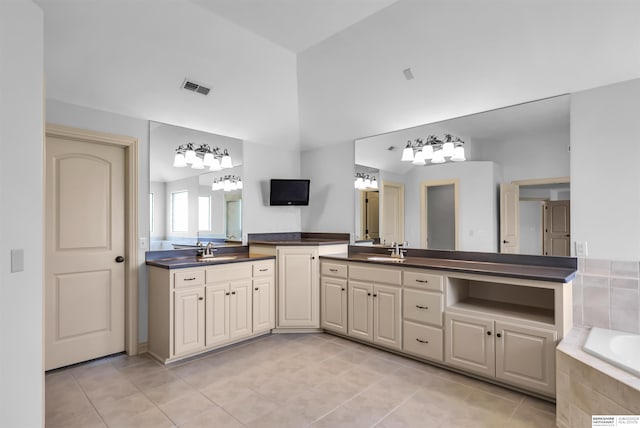 10149 Edward St, La Vista, NE 68128 - full bathroom with double vanity, tile patterned flooring, a bath, and lofted ceiling