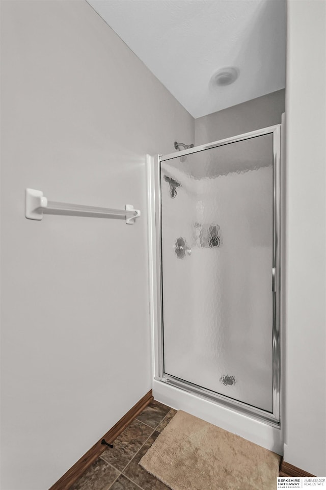 10149 Edward St, La Vista, NE 68128 - bathroom featuring a shower stall and baseboards