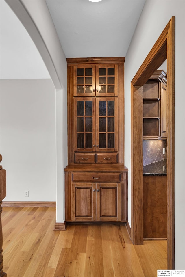 10149 Edward St, La Vista, NE 68128 - detailed view of arched walkways, wood finished floors, and backsplash