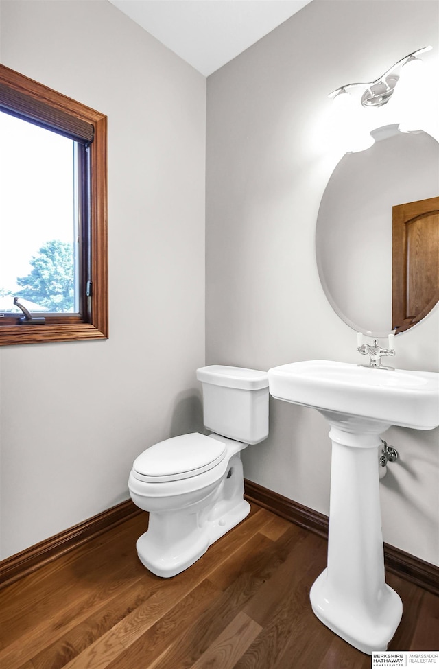 10149 Edward St, La Vista, NE 68128 - half bath featuring baseboards and wood finished floors