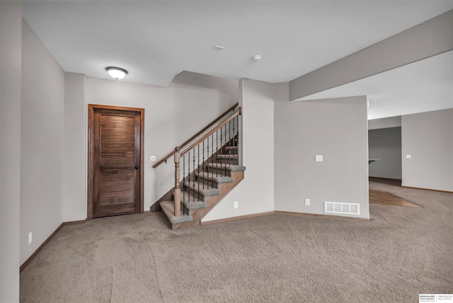 10149 Edward St, La Vista, NE 68128 - carpeted foyer with baseboards and stairs