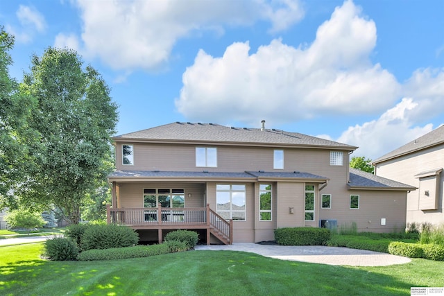 10149 Edward St, La Vista, NE 68128 - rear view of property featuring a yard and a wooden deck