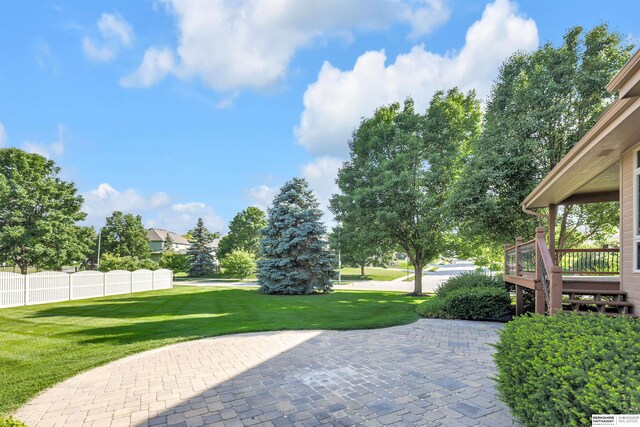 10149 Edward St, La Vista, NE 68128 - view of patio featuring a wooden deck