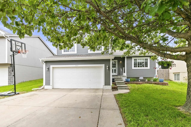 18667 R St, Omaha, NE 68135 - view of front of home with a front yard, an attached garage, and driveway